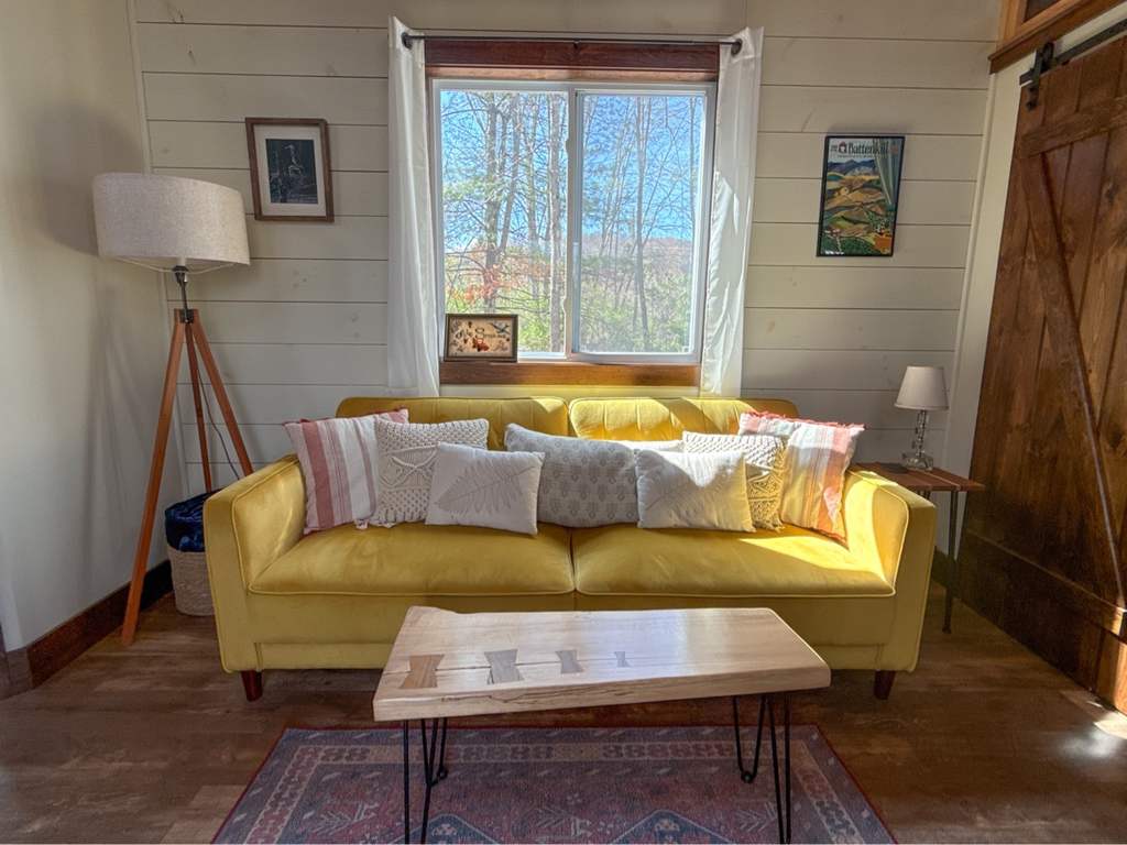 Tiny House living room with yellow sofa